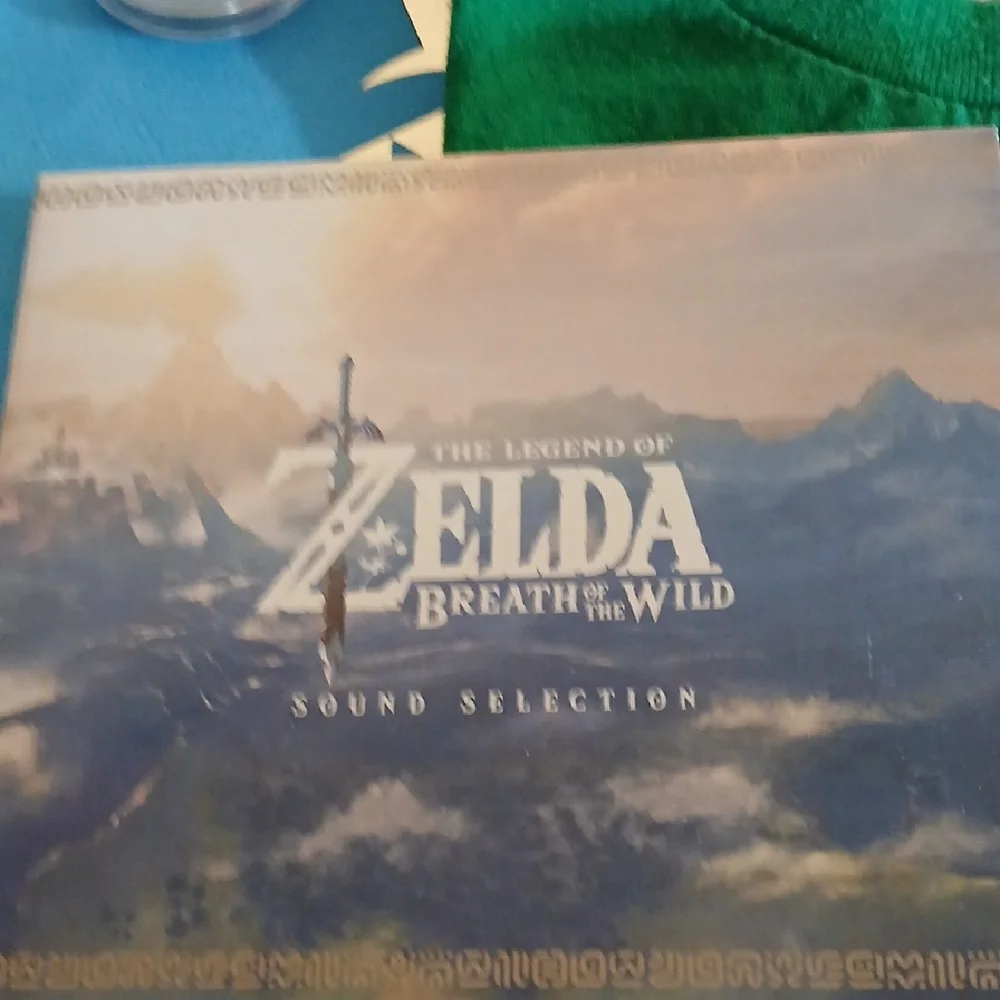 Green Zelda T-Shirt with Gold Triforce Design